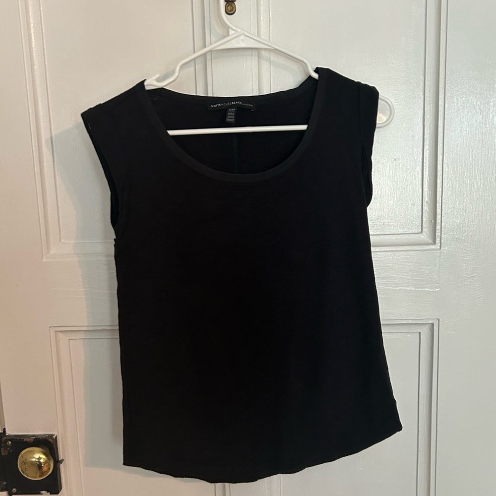 I am selling a black tank top that is size xxs in women’s.
